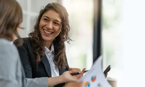 Project Manager Smiling During Meeting